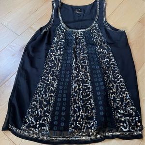 Black top with gold and silver sequins. Women’s XS.